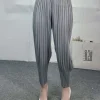 Vanite Couture. Pleated Tapered Pant.